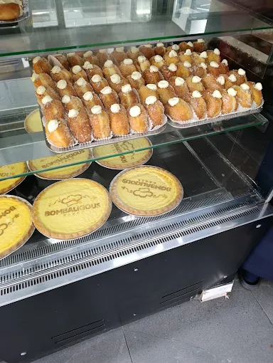 Bombalonis, sugared cream-filled doughnuts